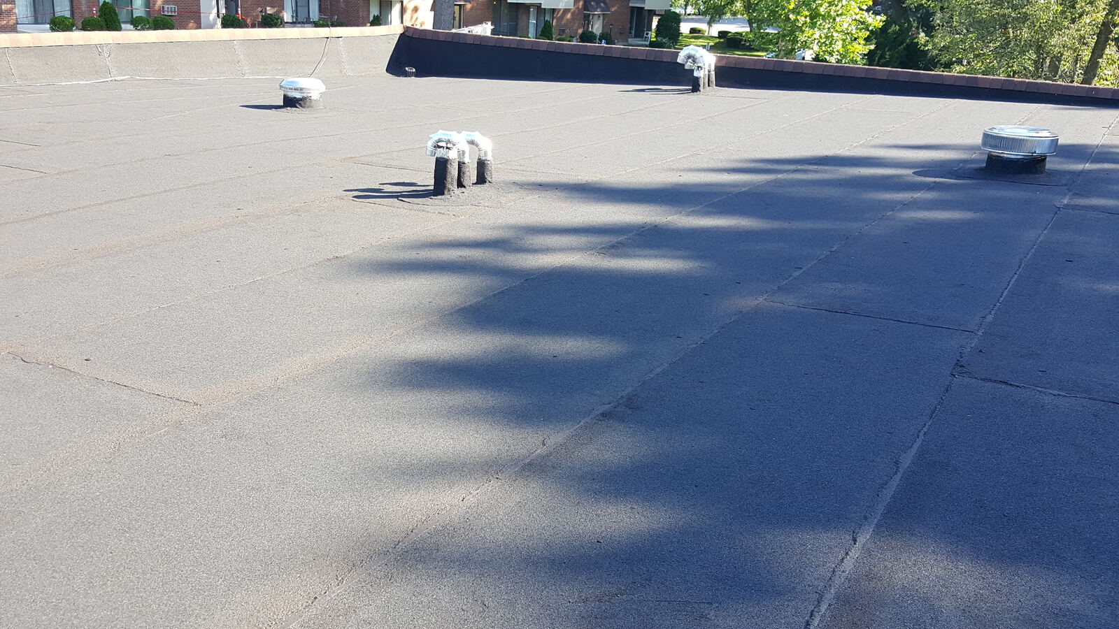 Granulated rubber flat roof with vents