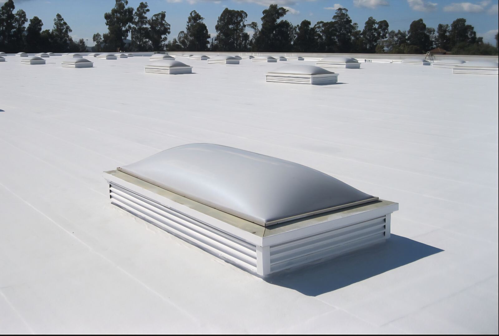Commercial TPO flat roof with skylight
